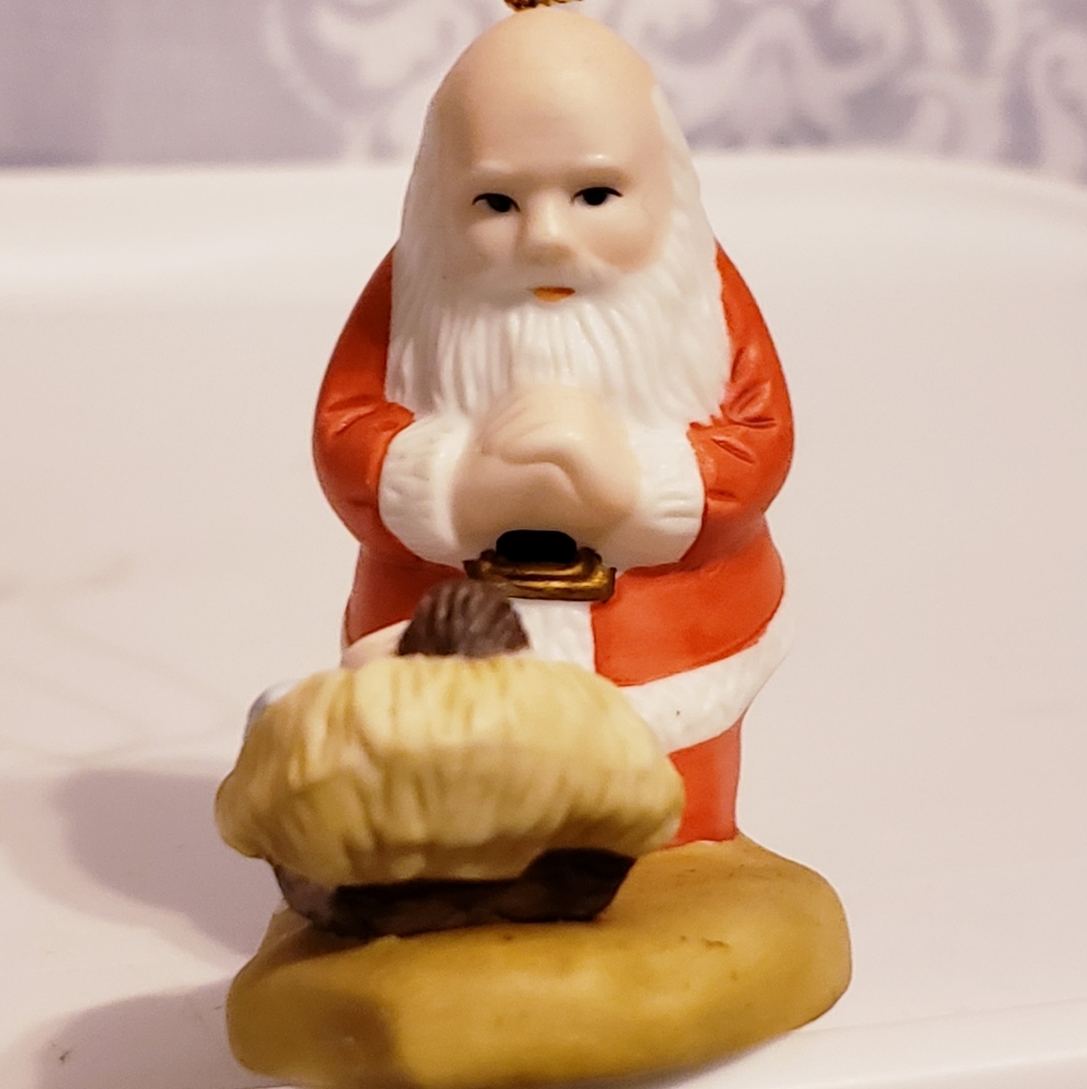 1985 Santa Over Baby Jesus Ornament